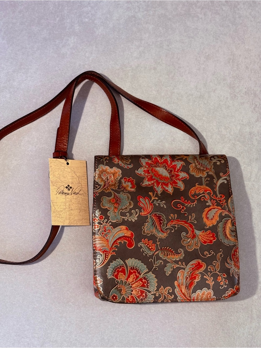 Patricia Nash Brown Crossbody with Red and Green Floral Embossing